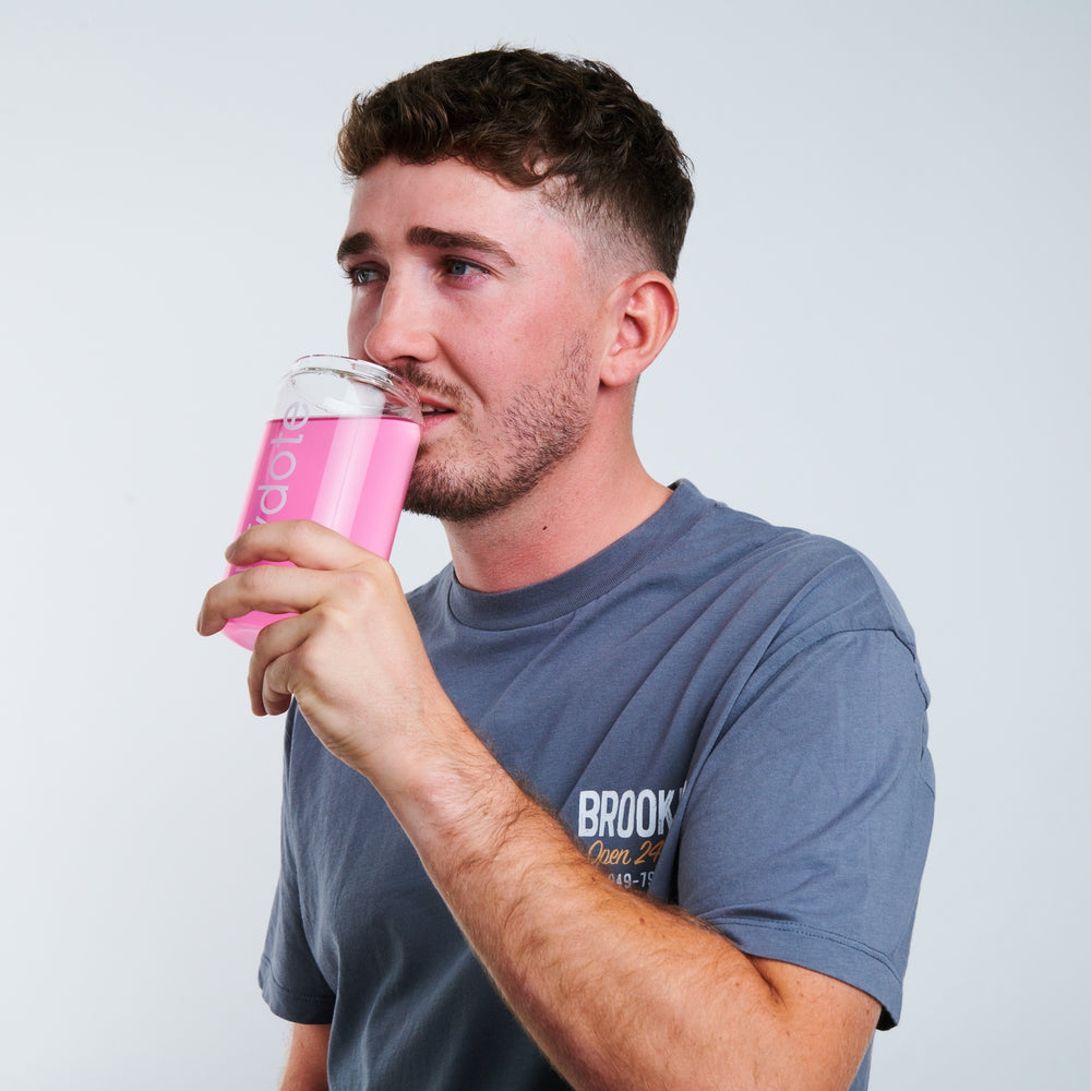 Man dropping electrolyte hydration tablet into drink